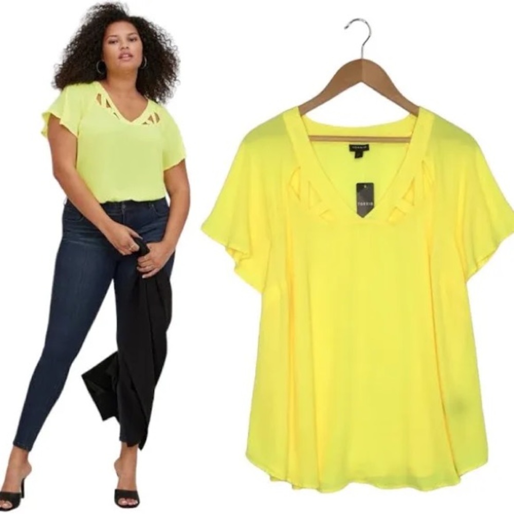 Beautiful yellow chiffon blouse! I never got to wear this. Torrid size 1